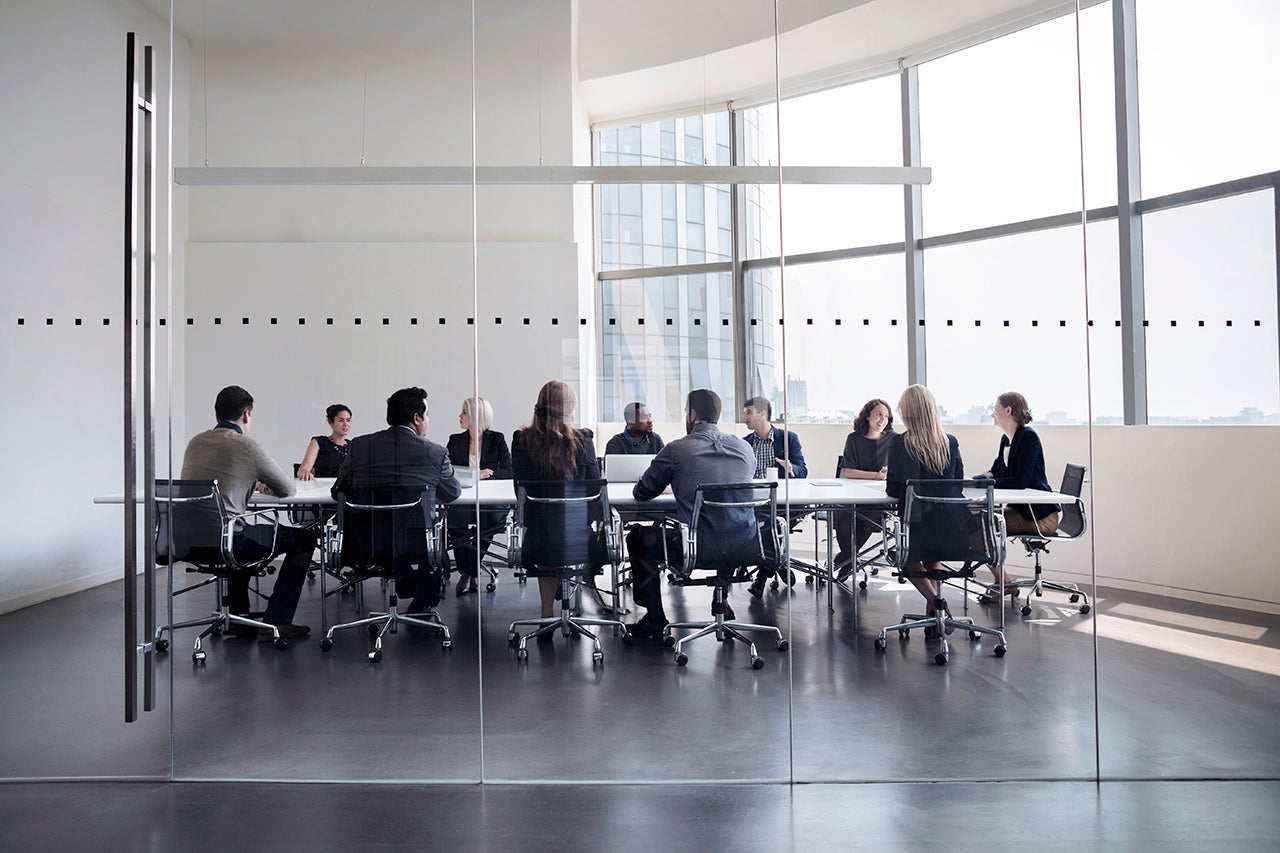 Colleagues at business meeting in conference room
