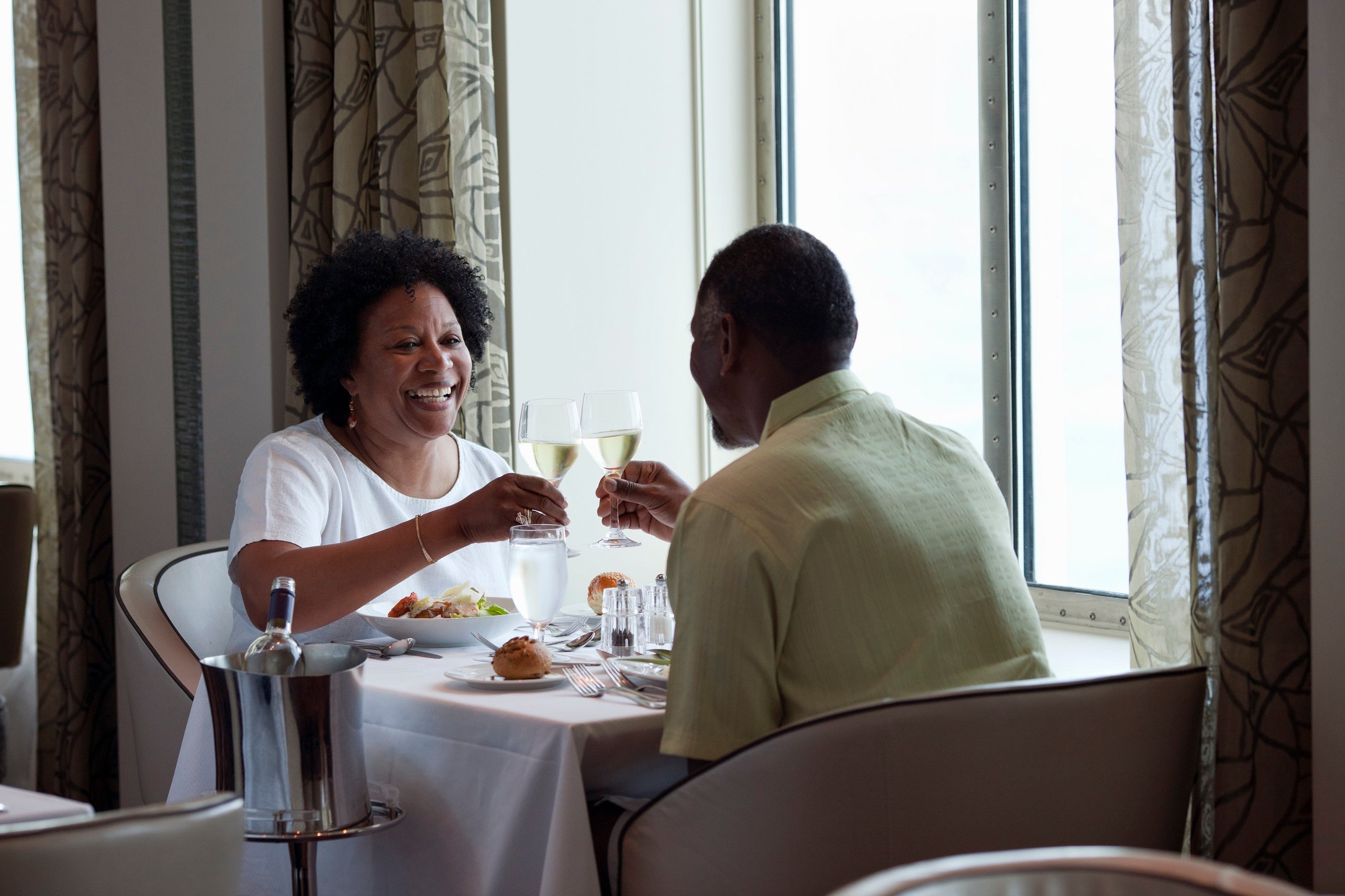 Couple having dinner on cruise ship