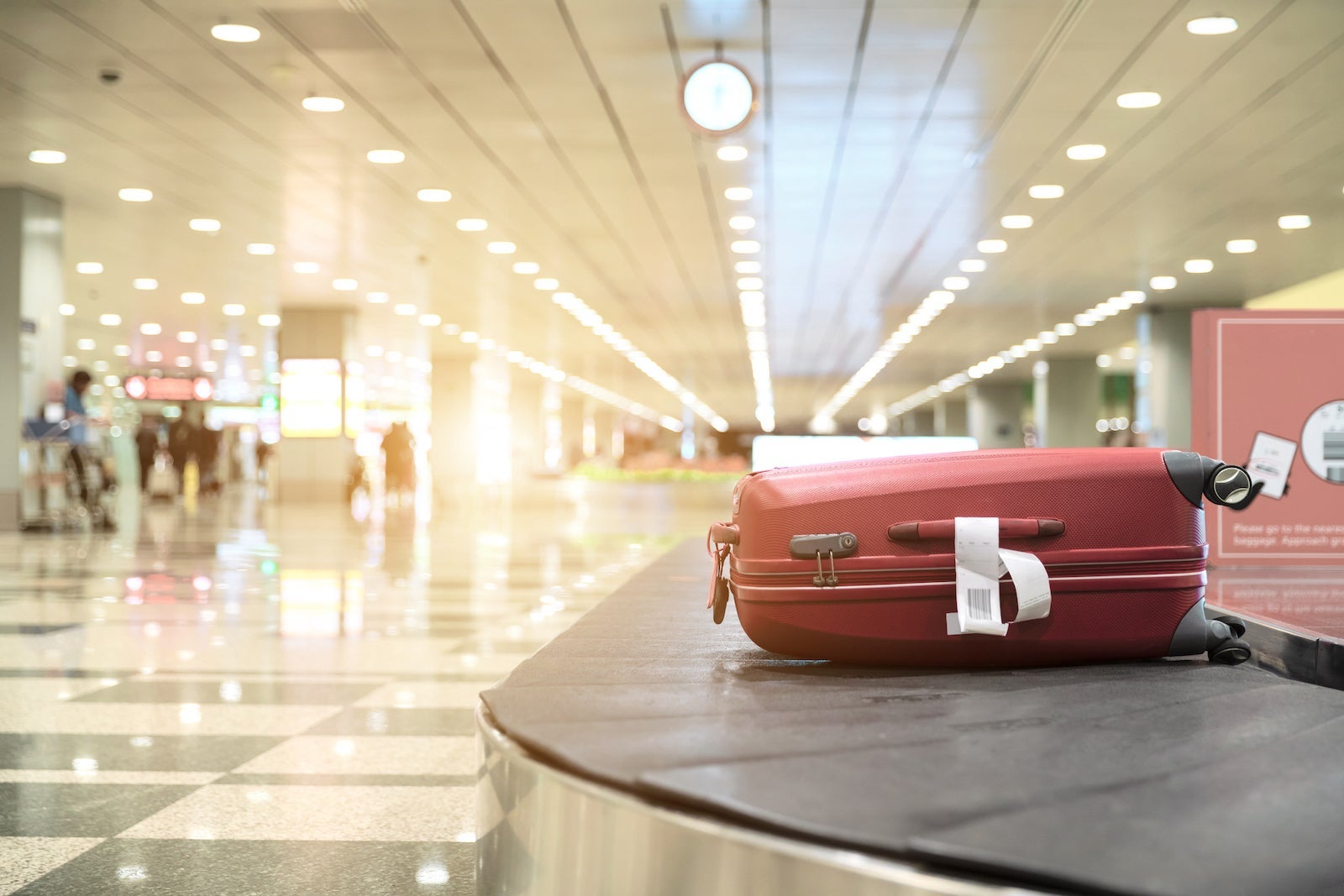 Luggage On Conveyor Belt At Airport