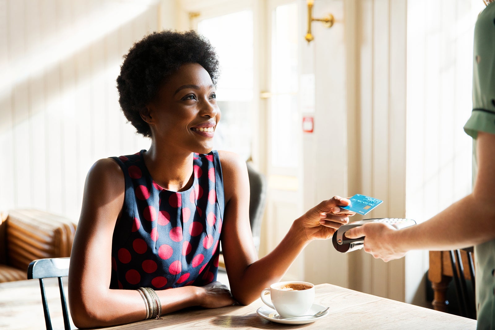 Woman using contactless payment