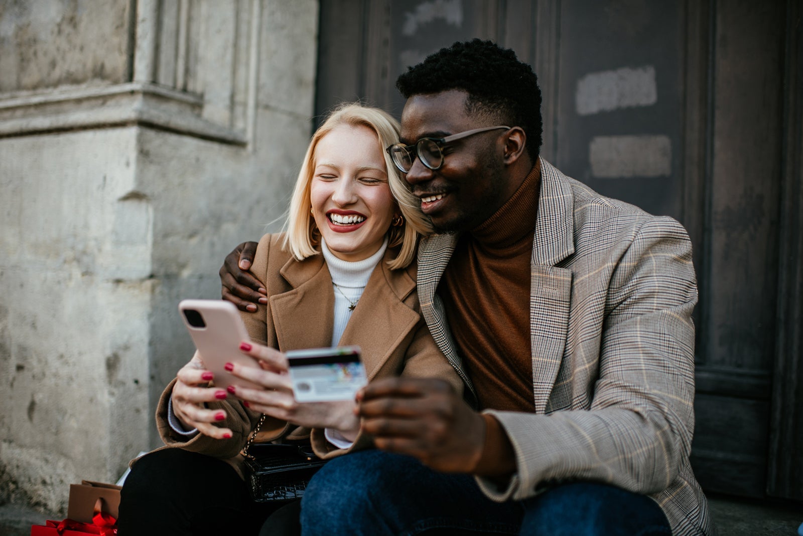 Young happy couple on the street