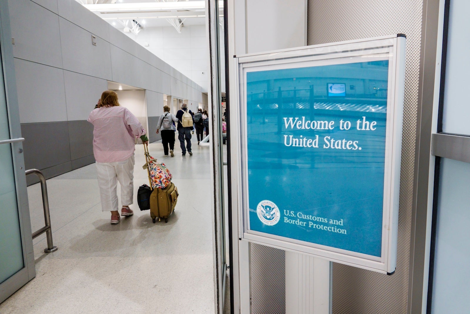 Miami, Florida, MIA Miami International Airport, terminal welcome sign US Customs and Border Protection