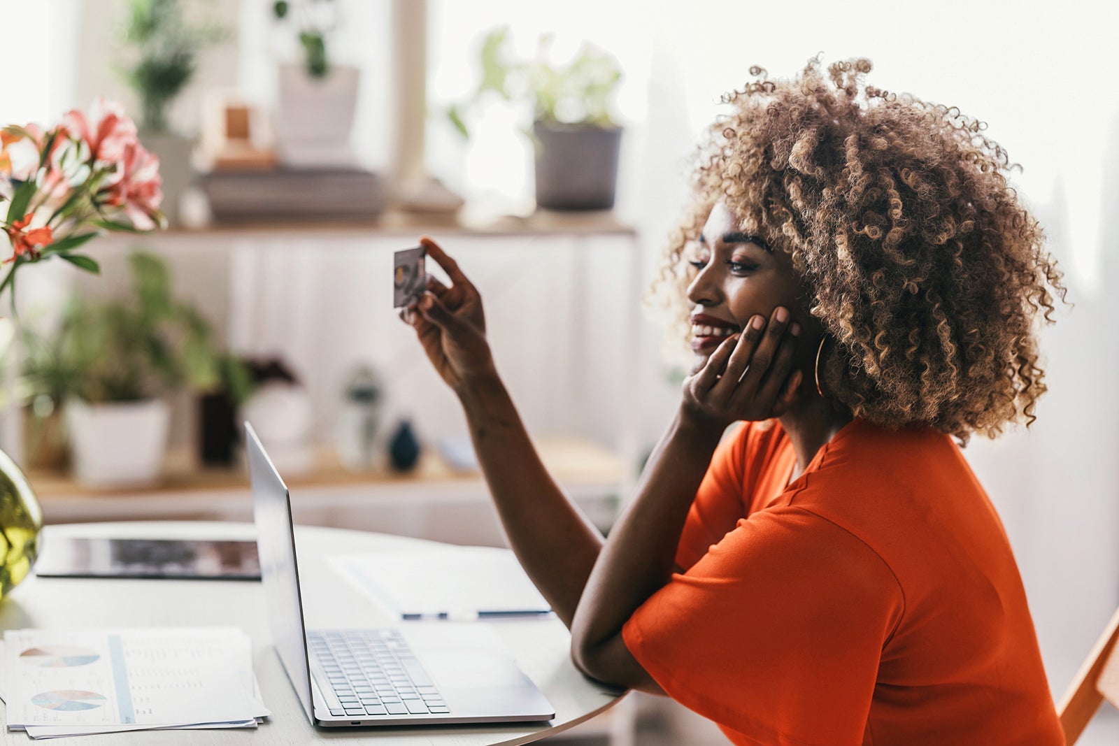 Happy African American Woman Shopping Online, Using her Credit Card