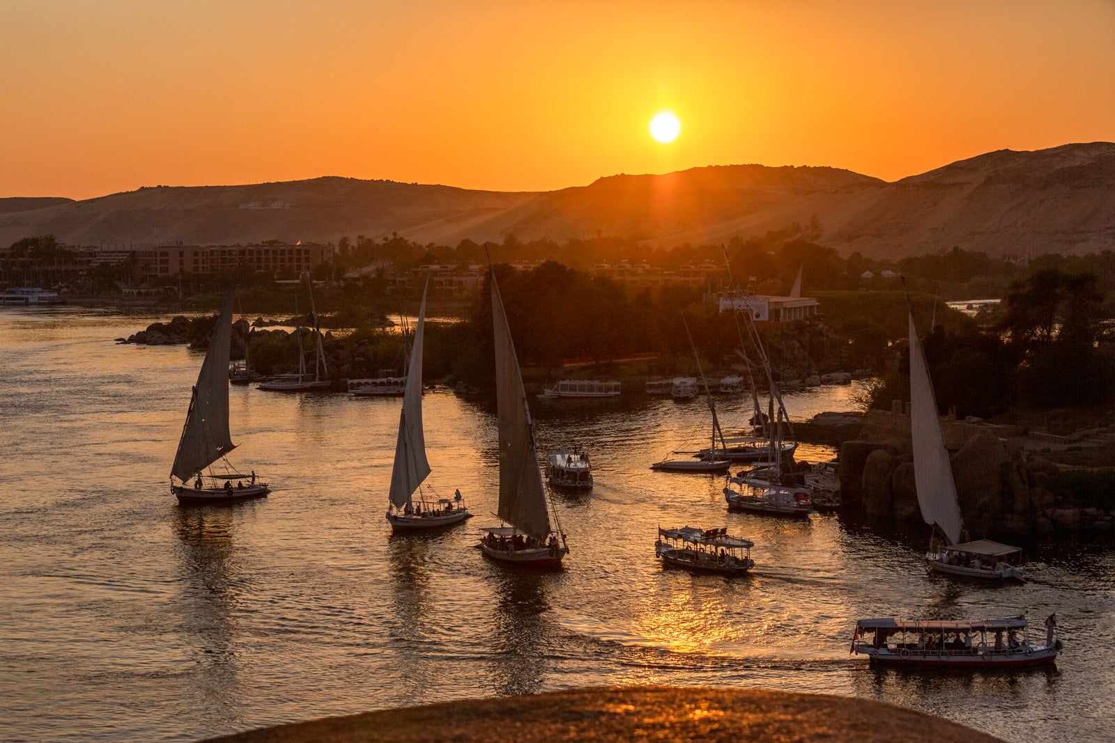 felucca boats on Nile river at sunset